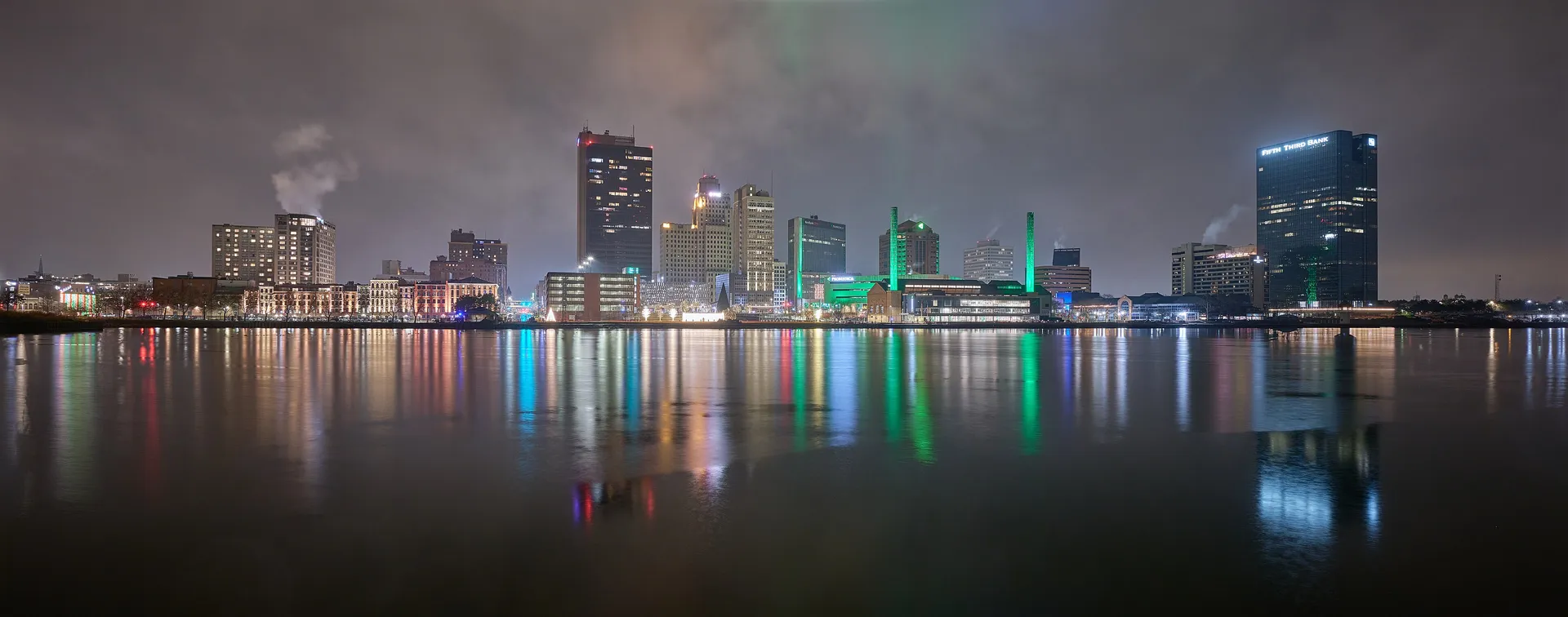 Downtown Toledo skyline reflected in the Maumee River at night